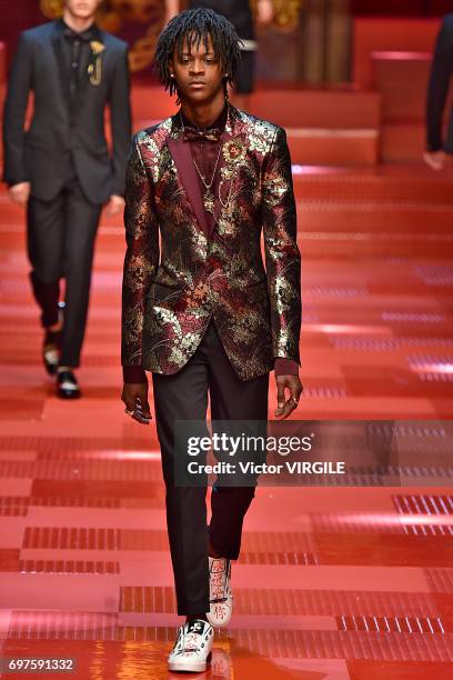 Myles O'Neal walks the runway at the Dolce & Gabbana show during Milan Men's Fashion Week Spring/Summer 2018 on June 17, 2017 in Milan, Italy.