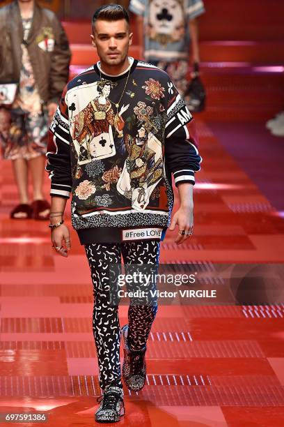 Model walks the runway at the Dolce & Gabbana show during Milan Men's Fashion Week Spring/Summer 2018 on June 17, 2017 in Milan, Italy.