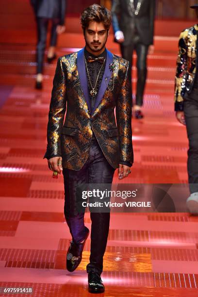 Avan Jogia walks the runway at the Dolce & Gabbana show during Milan Men's Fashion Week Spring/Summer 2018 on June 17, 2017 in Milan, Italy.