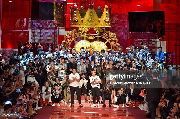 Designers Stefano Gabbana and Domenico Dolce walk the runway at the Dolce & Gabbana show during Milan Men's Fashion Week Spring/Summer 2018 on June...