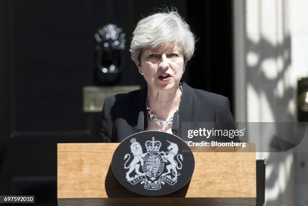 Theresa May, U.K. Prime minister, delivers a statement outside number 10 Downing Street, in London, U.K., on Monday, June 19, 2017. U.K. Police are...