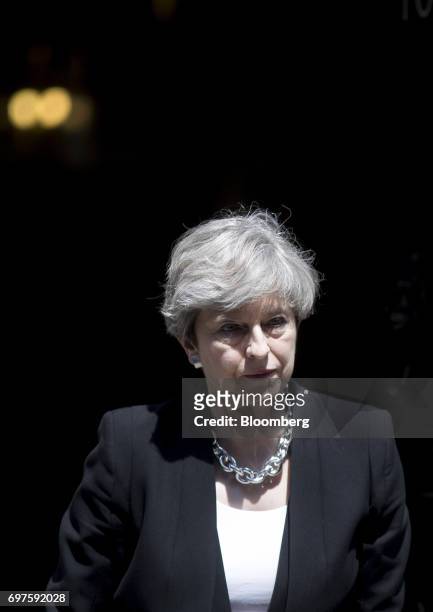 Theresa May, U.K. Prime minister, arrives to deliver a statement outside number 10 Downing Street, in London, U.K., on Monday, June 19, 2017. U.K....