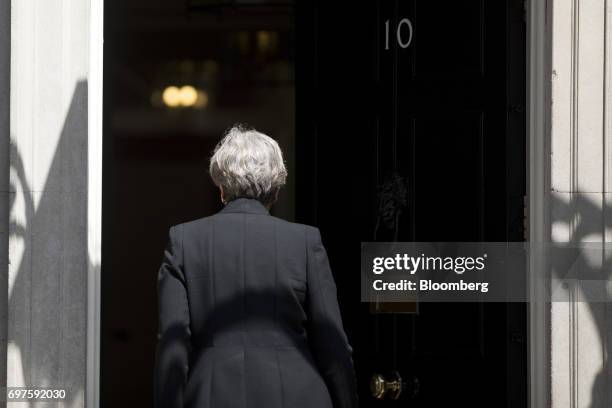 Theresa May, U.K. Prime minister, departs after delivering a statement outside number 10 Downing Street, in London, U.K., on Monday, June 19, 2017....