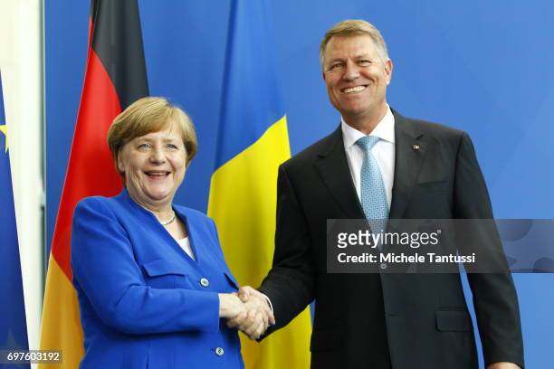 German Chancellor Angela Merkel and Romanian president Klaus Iohannis speak during a press conference following their meeting in the german...