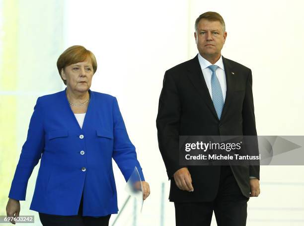 German Chancellor Angela Merkel and Romanian president Klaus Iohannis speak during a press conference following their meeting in the german...