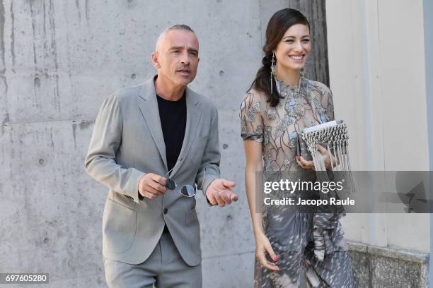Eros Ramazzotti and Marica Pellegrinelli attend the Giorgio Armani show during Milan Men's Fashion Week Spring/Summer 2018 on June 19, 2017 in Milan,...