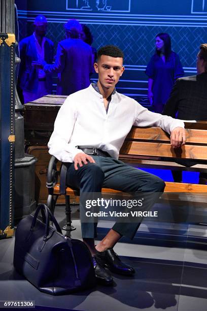 Model walks the runway at the Canali fashion show during Milan Men's Fashion Week Spring/Summer 2018 on June 17, 2017 in Milan, Italy.