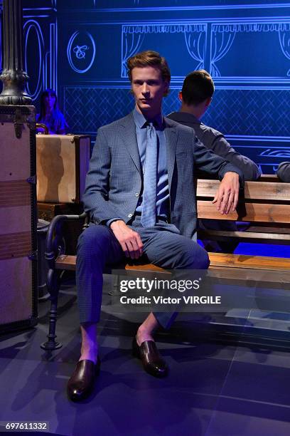 Model walks the runway at the Canali fashion show during Milan Men's Fashion Week Spring/Summer 2018 on June 17, 2017 in Milan, Italy.