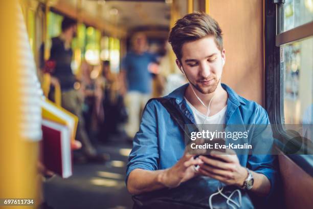 checking messages - city bus stock pictures, royalty-free photos & images