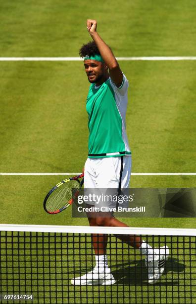 Jo-Wilfried Tsonga of France celebrates victory during the mens singles first round match against Adrian Mannarino of France during day one of the...