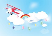 Paper art style airplane flying on sky with cloud and rainy background