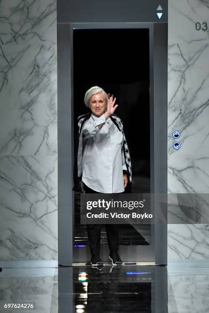 Designer Silvia Venturini Fendi acknowledges the applause of the audience after the Fendi show during Milan Men's Fashion Week Spring/Summer 2018 on...