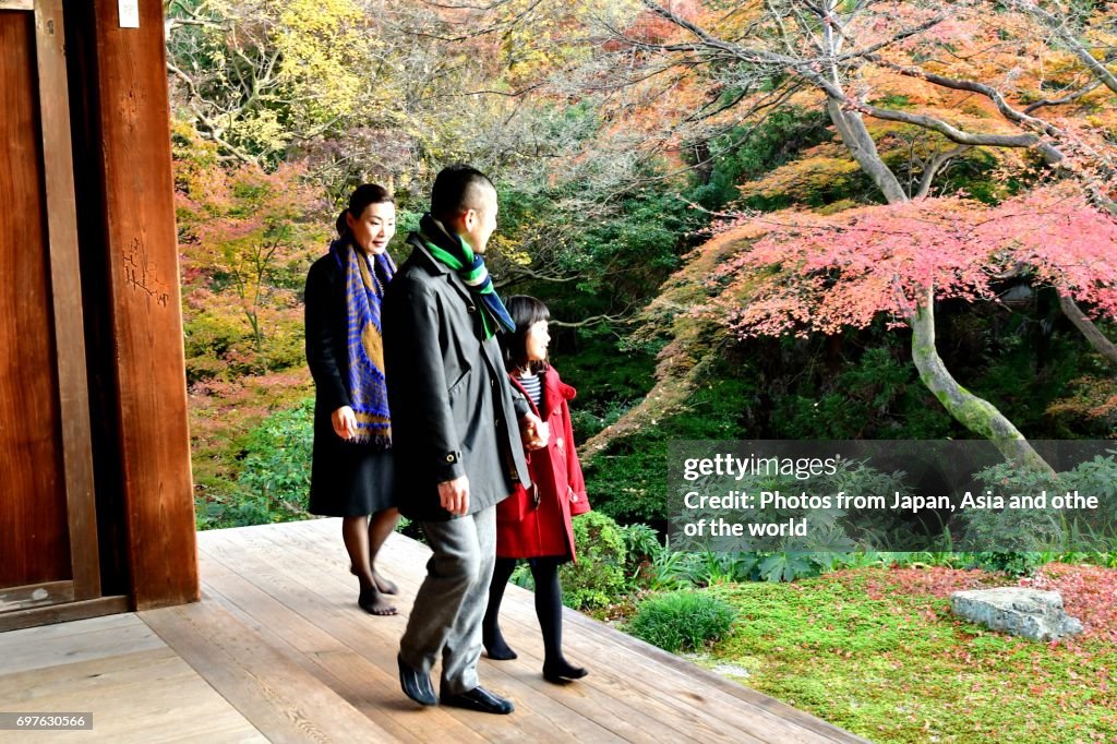 Japanese Family Appreciating Japanese Autumn Foliage at Tofuku-ji, Kyoto