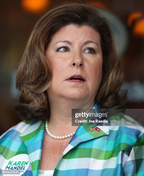 Republican candidate Karen Handel greets people during a campaign stop as she runs for Georgia's 6th Congressional District on June 19, 2017 in...