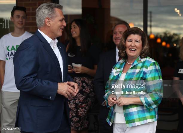 House Majority Leader Rep. Kevin McCarthy speaks with Republican candidate Karen Handel during a campaign stop as she runs for Georgia's 6th...