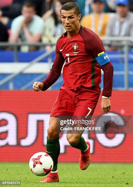 Portugal's forward Cristiano Ronaldo controls the ball during the 2017 Confederations Cup group A football match between Portugal and Mexico at the...