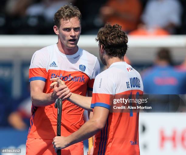 Mirco Pruijser of the Netherlands celebrates scoring his teams third goal with teammate Bob de Voogd during the Hero Hockey World League Semi-Final...