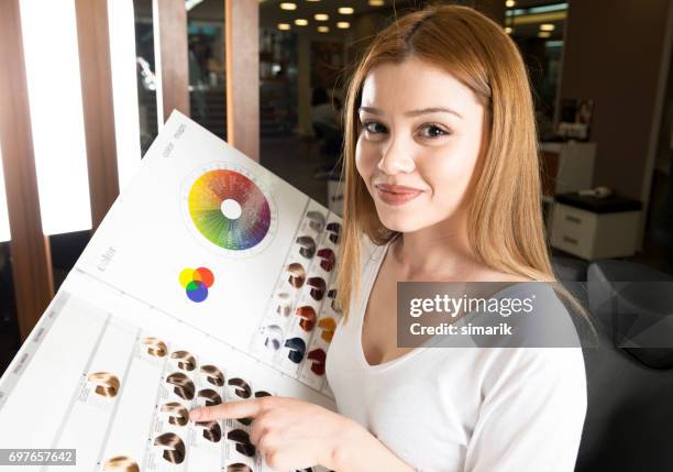 selecting hair color - one woman different roles drawing stock pictures, royalty-free photos & images
