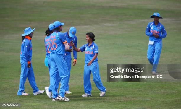 Poonam Yadav of India celebrates taking the wicket of Suzie Bates of New Zealand during the ICC Women's World Cup warm up match between India and New...