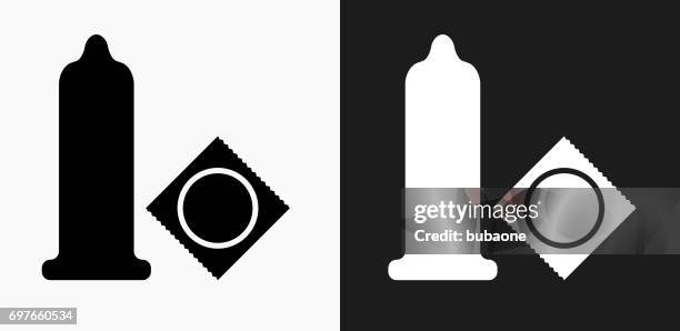 condom icon on black and white vector backgrounds - condom stock illustrations