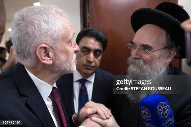British opposition Labour leader Jeremy Corbyn meets locals at Finsbury Park Mosque in north London where a vehicle was driven into pedestrians, on...