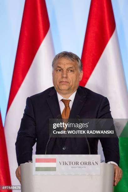 Hungarian Prime Minister Victor Orban is seen during a press conference on June 19, 2017 in Warsaw after a meeting of Visegrad Group and Benelux...