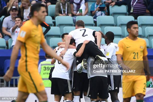 Germany's defender Shkodran Mustafi celebrates with team mates a goal by Germany's midfielder Lars Stindl during the 2017 Confederations Cup group B...