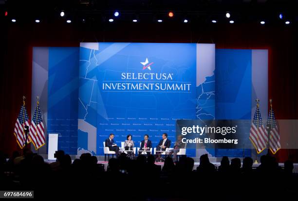 Jay Timmons, president and chief executive officer of the National Association of Manufacturers, from left, Safra Catz, co-chief executive officer of...