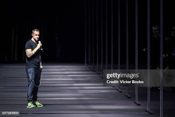 Designer Philipp Plein speaks on the runway at the Billionaire show during Milan Men's Fashion Week Spring/Summer 2018 on June 19, 2017 in Milan,...