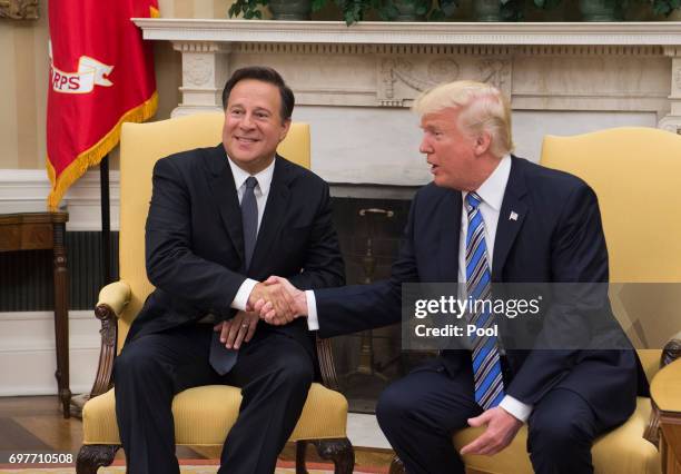 President Donald Trump meets with Panama's President Juan Carlos Varela in the Oval Office at the White House on June 19, 2017 in Washington, DC....