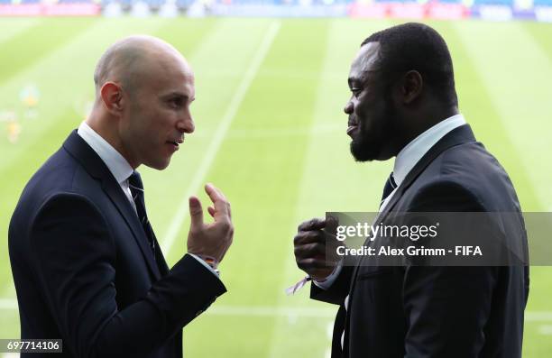 Legends Mark Bresciano and Gerald Asamoa in discussion during the FIFA Confederations Cup Russia 2017 Group B match between Australia and Germany at...