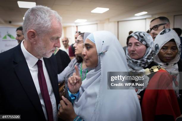 Labour leader Jeremy Corbyn talks to worshippers and local residents at Finsbury Park Mosque on June 19, 2017 in London, England. Worshippers were...