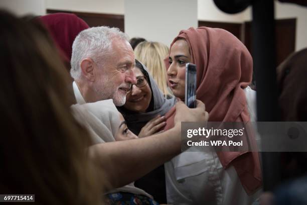 Labour leader Jeremy Corbyn talks to worshippers and local residents at Finsbury Park Mosque on June 19, 2017 in London, England. Worshippers were...