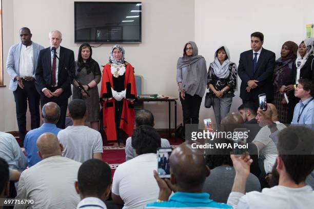 Labour leader Jeremy Corbyn talks to worshippers and local residents at Finsbury Park Mosque on June 19, 2017 in London, England. Worshippers were...