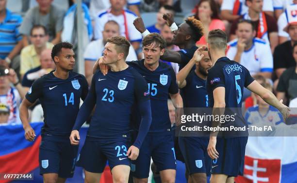 Alfie Mawson of England celebrates scoring his team's first goal during the UEFA European Under-21 Championship Group A match between Slovakia and...