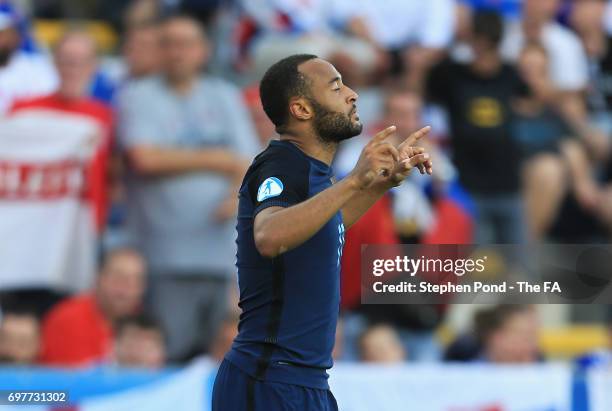 Nathan Redmond of England celebrates scoring his team's second goal during the UEFA European Under-21 Championship Group A match between Slovakia and...