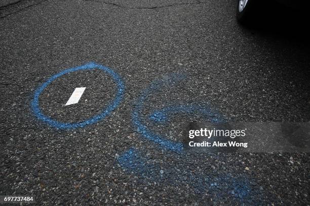 Evidence marking is seen on a street outside the Eugene Simpson Stadium Park, the site where House Majority Whip Rep. Steve Scalise was shot by...