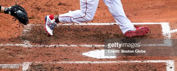 Red Sox designated hitter Hanley Ramirez wears his plastic cleats in the batter's box at Fenway Park in Boston on Apr. 12, 2017. His cleats which...