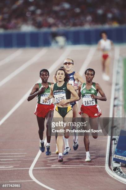 Portuguese bronze medal winning athlete Fernanda Ribeiro leads eventual Ethiopian gold and silver medal winning athletes Derartu Tulu and Gete Wami...