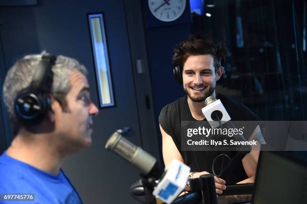 SiriusXM host Andy Cohen and Nico Tortorella pose for photos during a taping of 'Andy Cohen Live' on SiriusXM's Radio Andy at SiriusXM Studios on...