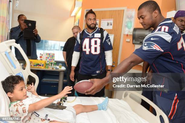 New England Patriots rookies Harvey Langi and Adam Butler visit Jose at Boston Children's Hospital June 19, 2017 in Boston, Massachusetts.