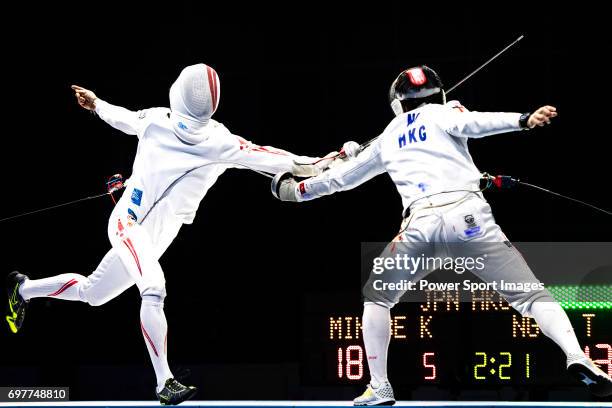 Tin Ho Ng of Hong Kong fences Kazuyasu Minobe of Japan during the Asian Fencing Championships 2017 on June 19, 2017 in Hong Kong, Hong Kong.