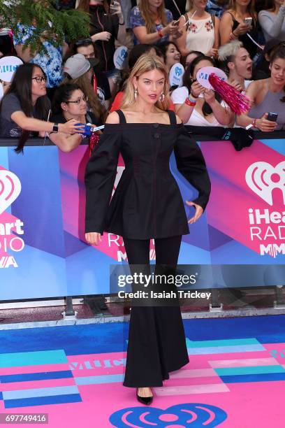 Martha Hunt arrives at the 2017 iHeartRADIO MuchMusic Video Awards at MuchMusic HQ on June 18, 2017 in Toronto, Canada.