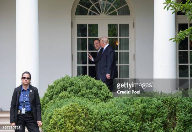 President Donald Trump and Panama's President Juan Carlos Varela walk to the Oval Office for their meeting at the White House on June 19, 2017 in...