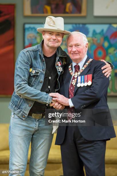 Canadian singer Gord Downie is invested as a Member of the Order of Canada by Governor General of Canada David Johnston at Rideau Hall on June 19,...