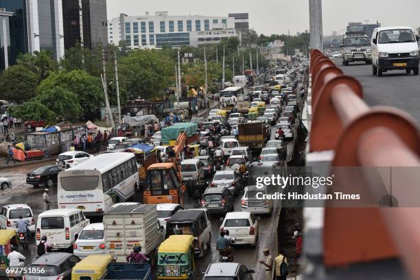 Traffic jam at Hero Honda Chowk, after the heavy rainfall lashed Delhi and NCR on June 19, 2017 in Gurgaon, India. With just one night of rain,...