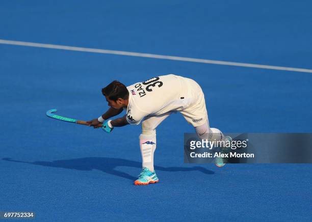 Izad Jamaluddin of Malaysia scores his teams first goal during the Pool A match between South Korea and Malaysia on day five of Hero Hockey World...