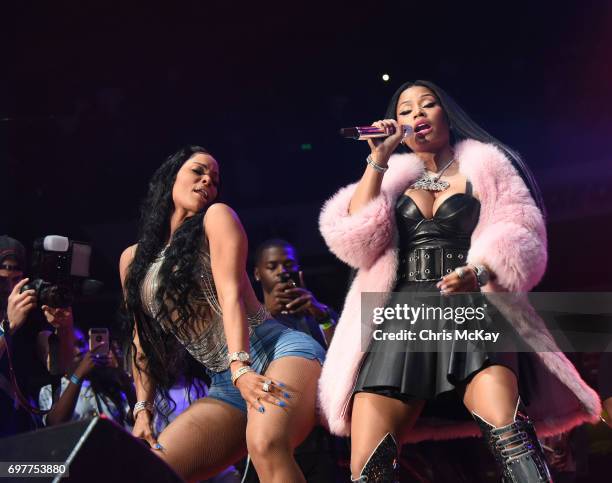 Keyshia Ka'oir and Nicki Minaj dance together during the Hot 107.9 Birthday Bash at Philips Arena on June 17, 2017 in Atlanta, Georgia.