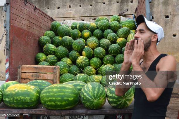 Street watermelon vendor seen inside Fes Medina. A scene from a daily life in Fes during the Ramadan 2017. On Monday, June 19 in Fes, Morocco.