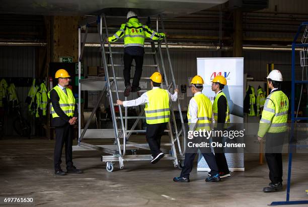 Crown Prince Naruhito of Japan visits MHI Vestas Offshore Wind where he is shown the large nacelle generator on June 19 Odense, Denmark. The windmill...